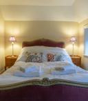 Apt 1 back bedroom bed 171619498