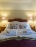 Apt 1 back bedroom bed 171619498